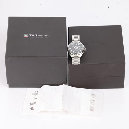 1006 - TAG HEUER - a stainless steel Formula 1 Alarm quartz calendar bracelet watch, ref. WAZ111A, circa 20... 