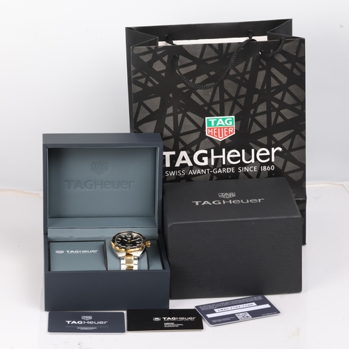 1007 - TAG HEUER - a gold plated stainless steel Formula 1 quartz calendar bracelet watch, ref. WAZ1121, bl... 