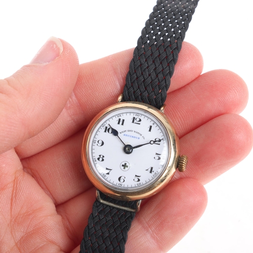 1031 - A First World War Period rolled gold Officer's style trench mechanical wristwatch, white enamel dial... 