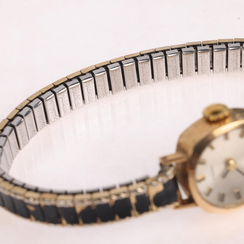 1032 - TISSOT - a lady's 9ct gold mechanical wristwatch, ref. 43486, circa 1968, concave silvered dial with... 