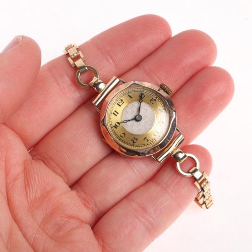 1033 - A lady's 9ct gold mechanical bracelet watch, circa 1930s, champagne and silvered textured dial with ... 