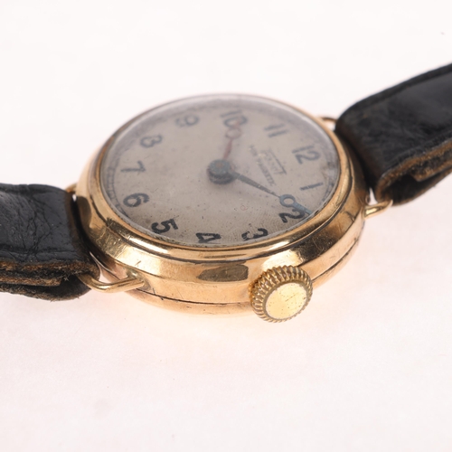 1034 - TISSOT - a lady's 9ct gold mechanical wristwatch, circa 1930s, silvered engine turned dial with blac... 