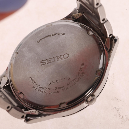 1055 - SEIKO - a stainless steel Sapphire 100M quartz bracelet watch, ref. 7N42-0FW0, black dial with polis... 