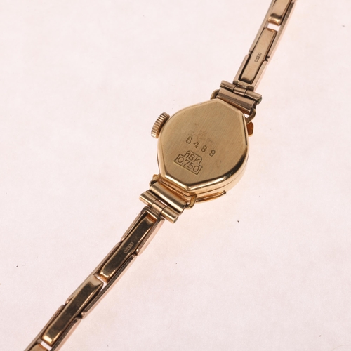 1061 - HELVROS - a lady's Vintage 18ct gold mechanical bracelet watch, circa 1960s, silvered dial with gilt... 