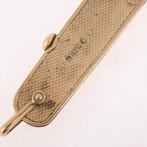 1224 - ALFRED DUNHILL - an Art Deco 9ct gold penknife, maker AD, London 1941, engine turned decoration, 7cm... 