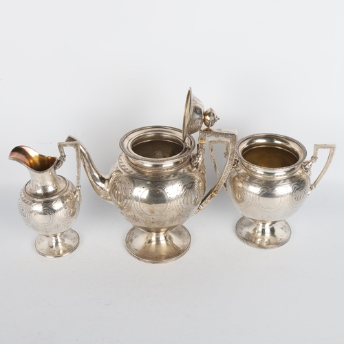 1764 - A Victorian silver 3-piece tea set, Henry Holland, London 1870, bulbous form, with beaded edge and b... 