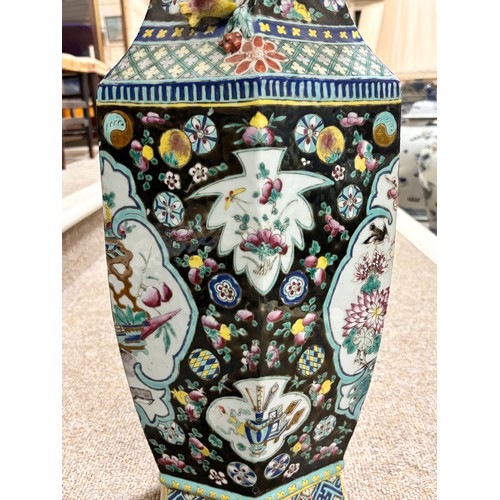 55 - A pair of Chinese porcelain vases, bulbous hexagonal form with pomegranate handles and enamelled dec... 