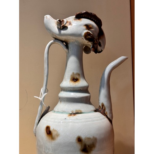 249 - An unusual Chinese glazed pottery ewer, height 31cm