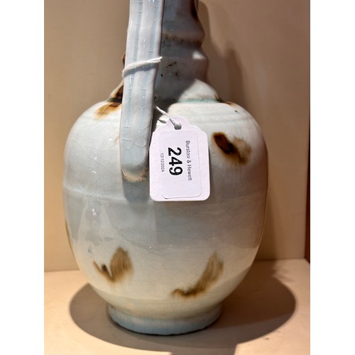 249 - An unusual Chinese glazed pottery ewer, height 31cm