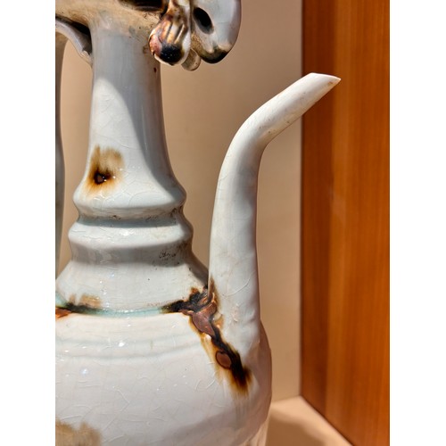 249 - An unusual Chinese glazed pottery ewer, height 31cm