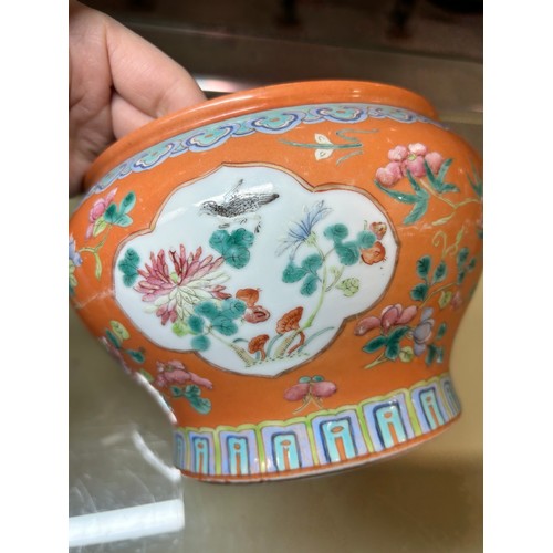 71 - A Chinese peach ground porcelain bowl, with painted enamel panels, overall diameter 19cm, height 12c... 