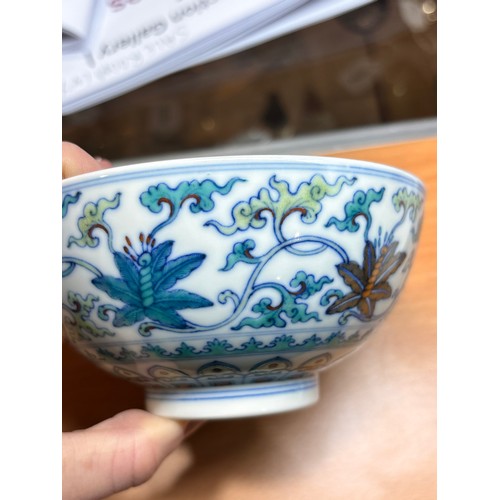 91 - A Chinese Doucai porcelain bowl with Qianlong mark, diameter 12cm, height 6cm