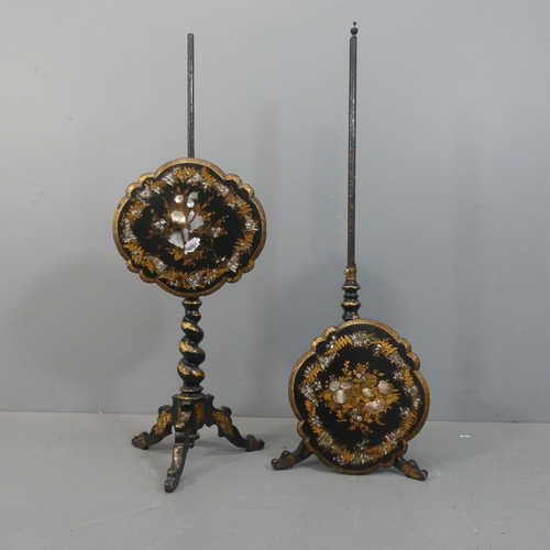 2036 - A pair of Victorian ebonised pole screens, with inlaid mother of pearl and gilt painted decoration. ... 