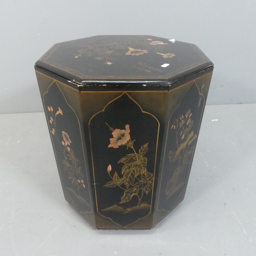 2038 - An oriental black lacquered octagonal coal scuttle, with painted floral decoration. Width 44cm, heig... 