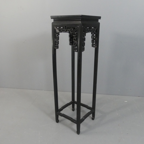 2039 - A Chinese black lacquered plant stand. Width 35cm, height 120cm.