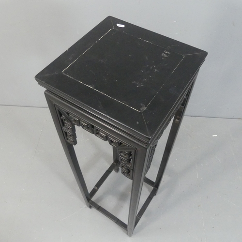 2039 - A Chinese black lacquered plant stand. Width 35cm, height 120cm.