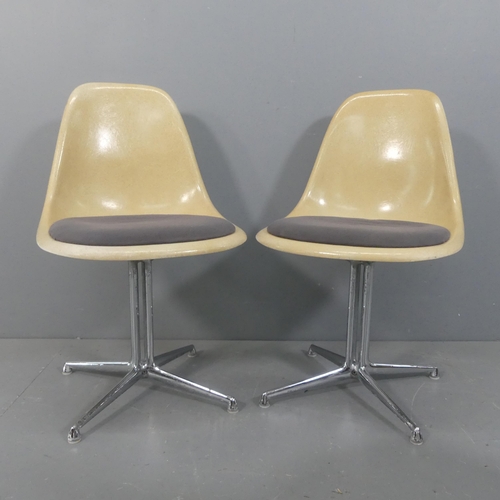 2044 - CHARLES EAMES - A pair of Vitra fibre glass side chairs with upholstered seat and on rare La Fonda b... 