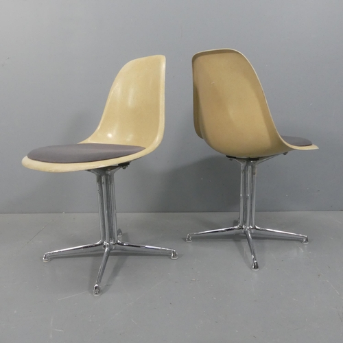 2044 - CHARLES EAMES - A pair of Vitra fibre glass side chairs with upholstered seat and on rare La Fonda b... 