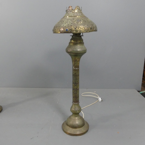 2052 - A 19th century Middle-Eastern Moorish pierced and chased brass floor lamp, converted from an oil lam... 