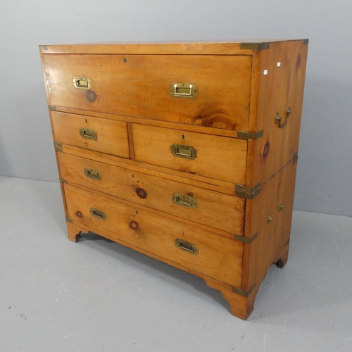 2057 - A late 19th / early 20th century pine two-section Campaign style secretaire chest, the fall-front dr... 