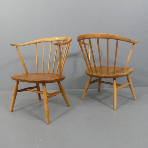 2062 - ERCOL - A pair of mid-century design Cowhorn model 338 chairs.