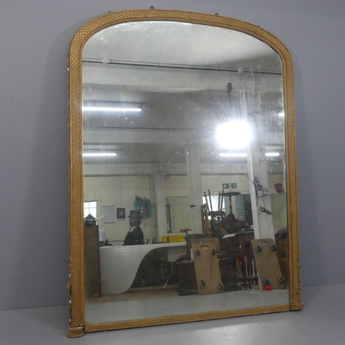 2064 - A large and impressive 19th century French over-mantle mirror, with ornate arch-top gilt-gesso frame... 