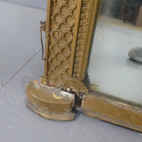 2064 - A large and impressive 19th century French over-mantle mirror, with ornate arch-top gilt-gesso frame... 