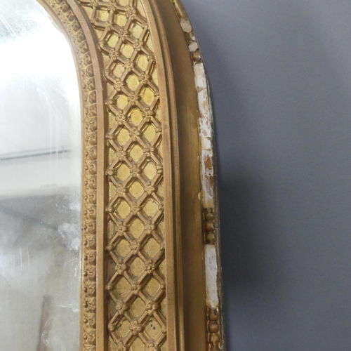 2064 - A large and impressive 19th century French over-mantle mirror, with ornate arch-top gilt-gesso frame... 