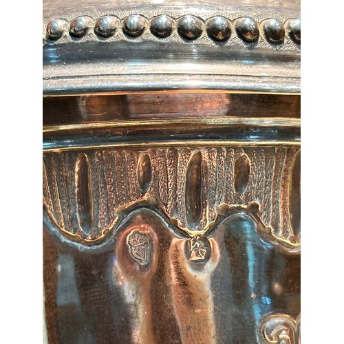 1762 - A Georgian Irish silver coffee pot, indistinct hallmarks, Dublin assay, baluster form with relief em... 