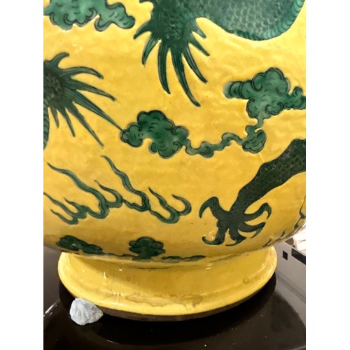 64 - A large Chinese yellow ground porcelain vase, with green enamel dragon decoration, height 56cm