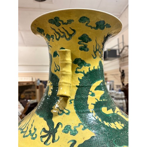 64 - A large Chinese yellow ground porcelain vase, with green enamel dragon decoration, height 56cm