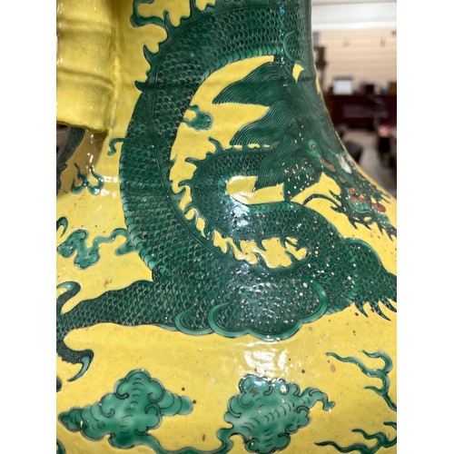 64 - A large Chinese yellow ground porcelain vase, with green enamel dragon decoration, height 56cm