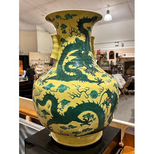 64 - A large Chinese yellow ground porcelain vase, with green enamel dragon decoration, height 56cm