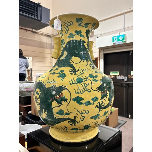 64 - A large Chinese yellow ground porcelain vase, with green enamel dragon decoration, height 56cm