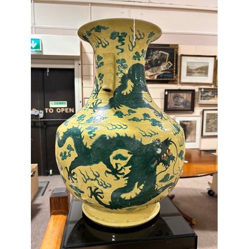 64 - A large Chinese yellow ground porcelain vase, with green enamel dragon decoration, height 56cm