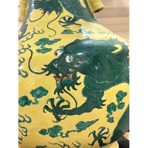 64 - A large Chinese yellow ground porcelain vase, with green enamel dragon decoration, height 56cm