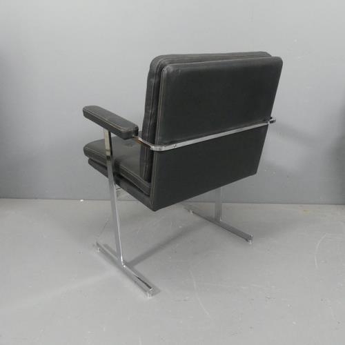 2242 - ROBIN DAY - A mid-century Hille Delphi leather and chrome armchair or desk chair on T shaped legs, w... 