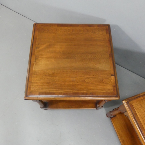 2244 - A pair of oak and mahogany two-tier lamp tables, labelled for Simpson's of Norfolk. Width 55cm, heig... 