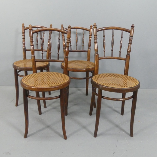 2252 - A set of four cane seated bistro / dining chairs, in the manner of Thonet.