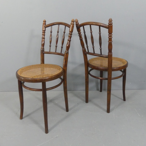 2252 - A set of four cane seated bistro / dining chairs, in the manner of Thonet.