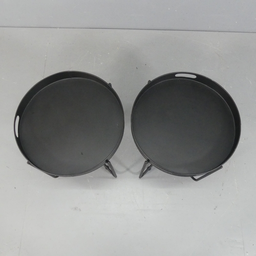 2254 - A pair of contemporary circular tray top occasional tables on tubular metal bases. Diameter 48cm, he... 