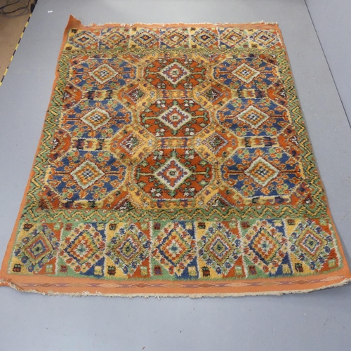 2295 - A large orange-ground tufted wool carpet. Length 225cm, width 175cm.