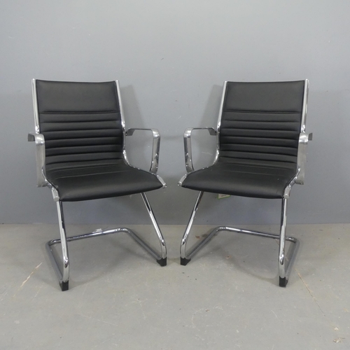 2376 - A pair of Eames style office chairs, with faux-leather upholstery on tubular metal cantilever base.... 