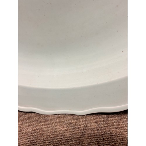 41 - A massive Chinese celadon glaze porcelain charger, 5 character text mark to the rim, diameter 95cm