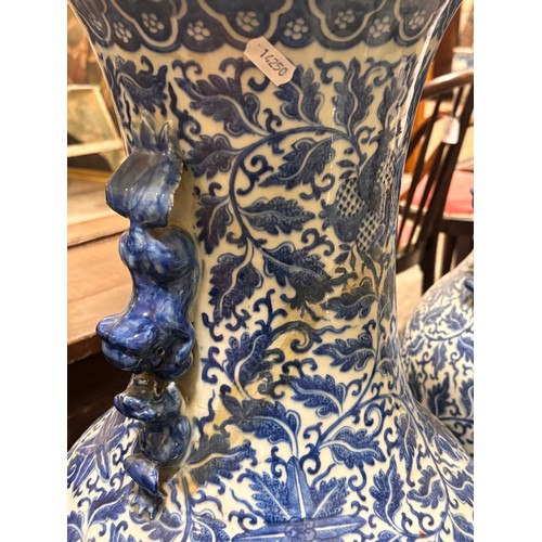 54 - A large pair of Chinese blue and white porcelain jars, with dragon handles, height 82cm, 1 A/F