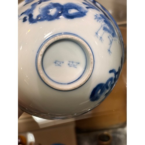 72 - A Chinese blue and white porcelain bowl with metal rim and 2 character mark, diameter 11cm