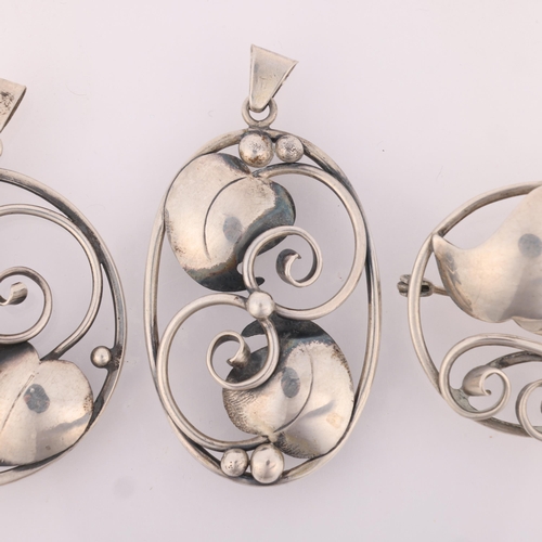 576 - A group of Danish modernist silver floral openwork jewellery, makers include Brumberg Hansen, compri... 