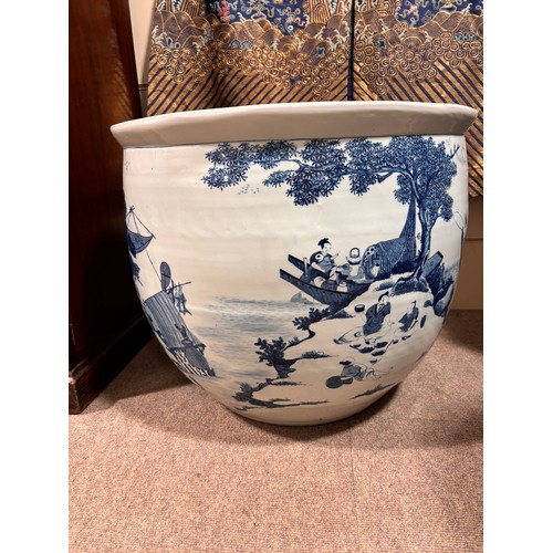 46 - A large Chinese blue and white porcelain fish bowl, decorated with boats among the reeds, diameter 5... 