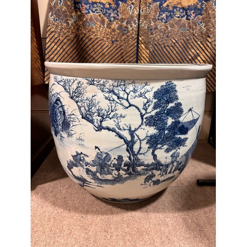 46 - A large Chinese blue and white porcelain fish bowl, decorated with boats among the reeds, diameter 5... 