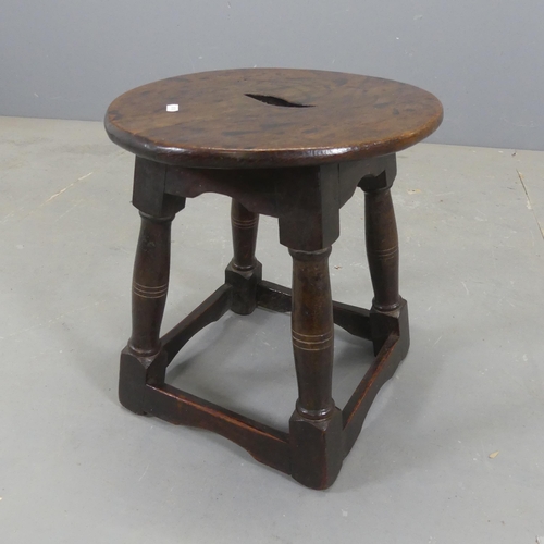 2306 - A 19th century oak joint stool with later seat. Width 33cm, height 42cm.